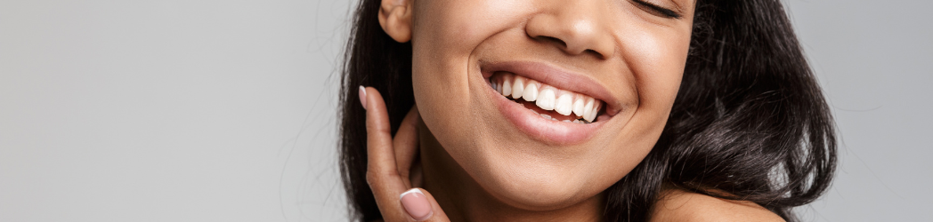 Smiling woman with clear skin